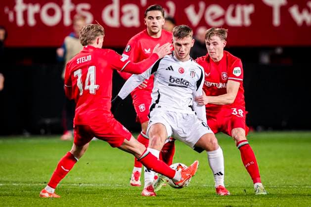 2025-01-30 FC Twente v Besiktas JK - UEFA Europa League 2024 25 League Phase MD8 ENSCHEDE, NETHERLANDS - JANUARY 30: Semih Kilicsoy of Besiktas JK battles for possession with Sem Steijn of FC Twente and Max Bruns of FC Twente during the UEFA Europa League 2024 25 League Phase MD8 match between FC Twente and Besiktas JK at De Grolsch Veste on January 30, 2025 in Enschede, Netherlands. Enschede De Grolsch Veste Netherlands Content not available for redistribution in The Netherlands directly or indirectly through any third parties. Copyright: xPeterxLousx