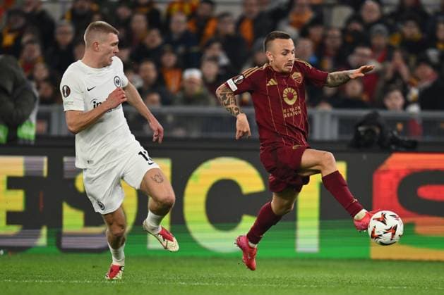 AS Roma v Eintracht Frankfurt - UEFA Europa League 2024 25 League Phase MD8 Rasmus Kristensen of Eintracht Frankfurt and Angelino of A.S. Roma are in action during the UEFA Europa League 2024 25 League Phase MD8 match between A.S. Roma and Eintracht Frankfurt at Olympic Stadium in Rome, Italy, on January 30, 2025. Rome Italy Italy  Copyright: xDomenicoxCippitellix originalFilename:cippitelli-asromave250130_npJFr.jpg