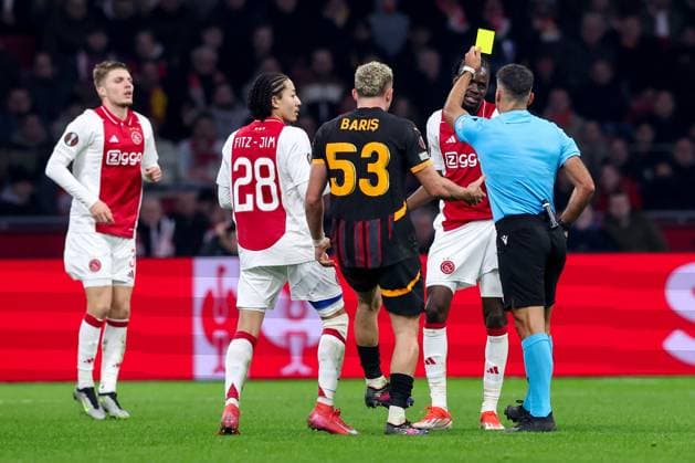 2025-01-30 AFC Ajax v Galatasaray - UEFA Europa League 2024 25 League Phase MD8 AMSTERDAM, NETHERLANDS - JANUARY 30: Referee Jesus Gil Manzano shows a yellow card to Betrand Traore of AFC Ajax during the UEFA Europa League 2024 25 League Phase MD8 match between AFC Ajax and Galatasaray at Johan Cruijff ArenA on January 30, 2025 in Amsterdam, Netherlands. Amsterdam Johan Cruijff ArenA Netherlands Content not available for redistribution in The Netherlands directly or indirectly through any third parties. Copyright: xBenxGalx