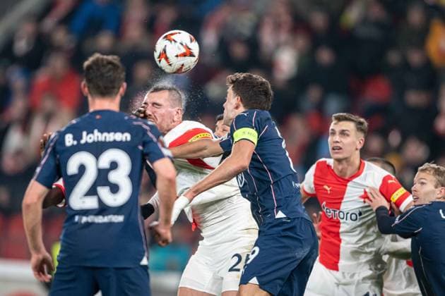 Tomas Chory in a header battle during UEFA Europa league match, SK Slavia Prague - Malmo FF , 30. january 2025, Fortuna Arena, Prague, Czech republic Copyright: xMICHALxFAJT,ZOSPORTU.SKx MAJ_4023