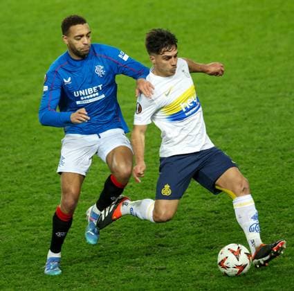 Cyriel Dessers of Rangers in action with Kevin Mac Allister of Union Saint-Gilloise during the UEFA Europa League league phase match at Ibrox Stadium, Glasgow. Rangers v Union Saint-Gilloise, Europa League, Football, Ibrox Stadium, Glasgow, Scotland, UK - 30 Jan 2025 EDITORIAL USE ONLY No use with unauthorised audio, video, data, fixture lists, club league logos or live services. Online in-match use limited to 120 images, no video emulation. No use in betting, games or single club league player publications. Copyright: xRangersxFC Shutterstockx 15126400x