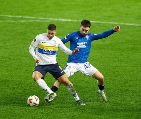 Nicolas Raskin of Rangers in action with Franjo Ivanovic of Union Saint-Gilloise during the UEFA Europa League league phase match at Ibrox Stadium, Glasgow. Rangers v Union Saint-Gilloise, Europa League, Football, Ibrox Stadium, Glasgow, Scotland, UK - 30 Jan 2025 EDITORIAL USE ONLY No use with unauthorised audio, video, data, fixture lists, club league logos or live services. Online in-match use limited to 120 images, no video emulation. No use in betting, games or single club league player publications. Copyright: xRangersxFC Shutterstockx 15126400ae