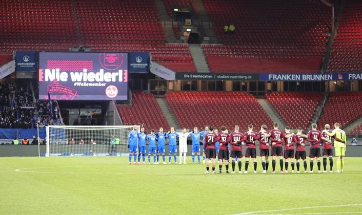 31 01 2025 Soccer Season 2024 2025 2 Soccer Bundesliga 20 Matchday 1 FC Nürnberg FCN Club SV Darmstadt 98 SVD Lilien Sportfoto Zink DaMa xdaxmax DFL regulations prohibit any use of photographs as image sequences and or quasi video only for editorial use Symbolbild Symbolfoto Feature Impression Minute of silence before the start of the match Never again