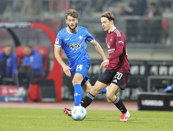 31 01 2025 Soccer Season 2024 2025 2 Soccer Bundesliga 20 Matchday 1 FC Nürnberg FCN Club SV Darmstadt 98 SVD Lilien Sportfoto Zink DaMa xdaxmax DFL regulations prohibit any use of photographs as image sequences and or quasi video only for editorial use Killian Corredor 34, SV Darmstadt 98 D98 SV98 Caspar Jander 20, 1 FC Nürnberg FCN