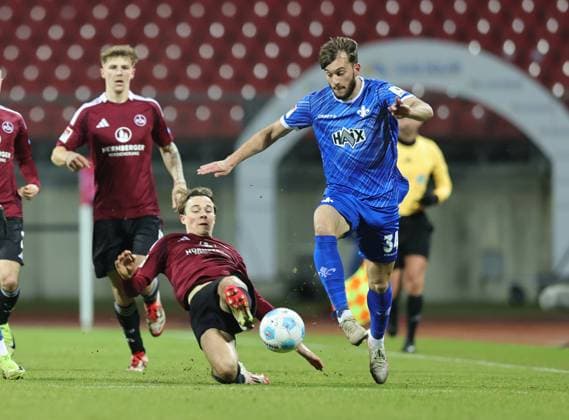 31 01 2025 Soccer Season 2024 2025 2 Soccer Bundesliga 20 Matchday 1 FC Nürnberg FCN Club SV Darmstadt 98 SVD Lilien Sportfoto Zink DaMa xdaxmax DFL regulations prohibit any use of photographs as image sequences and or quasi video only for editorial use Caspar Jander 20, 1 FC Nürnberg FCN Killian Corredor 34, SV Darmstadt 98 D98 SV98