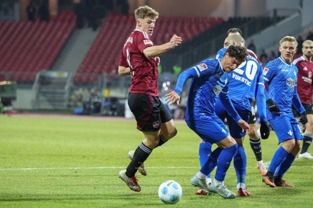 Finn Jeltsch 1FC Nuernberg 4 i, duel with Christoph Zimmermann SV Darmstadt 98 4 , 1 FC Nuernberg vs SV Darmstadt 98, Soccer, 2 Bundesliga, 20 Matchday, 31 01 2025 DFB regulations prohibit any use of photographs as image sequences and or quasi video Nuernberg Bayern Germany Copyright: xkolbert-press MartinxAgüerax