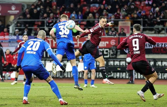 31 01 2025 Soccer Season 2024 2025 2 Soccer Bundesliga 20 Matchday 1 FC Nürnberg FCN Club SV Darmstadt 98 SVD Lilien Sportfoto Zink DaMa xdaxmax DFL regulations prohibit any use of photographs as image sequences and or quasi video only for editorial use Clemens Riedel 38, SV Darmstadt 98 D98 SV98 in header duel with Julian Justvan 10, 1 FC Nürnberg FCN