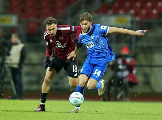 31 01 2025 Soccer Season 2024 2025 2 Soccer Bundesliga 20 Matchday 1 FC Nürnberg FCN Club SV Darmstadt 98 SVD Lilien Sportfoto Zink DaMa xdaxmax DFL regulations prohibit any use of photographs as image sequences and or quasi video only for editorial use Rafael Lubach 18, 1 FC Nürnberg FCN Killian Corredor 34, SV Darmstadt 98 D98 SV98