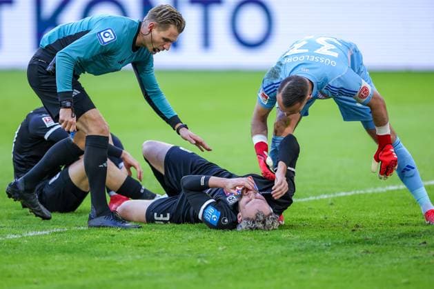 01 02 2025, Football, Fortuna Düsseldorf SSV Ulm 1846, 2 Fußball Bundesliga, 20 Matchday, Merkur Spiel Arena, Season 2024 2025 Philipp Strompf SSV Ulm 32 lies with pain on the pitch DFB regulations prohibit any use of photographs as image sequences and or quasi video Nordrhein Westfalen Germany