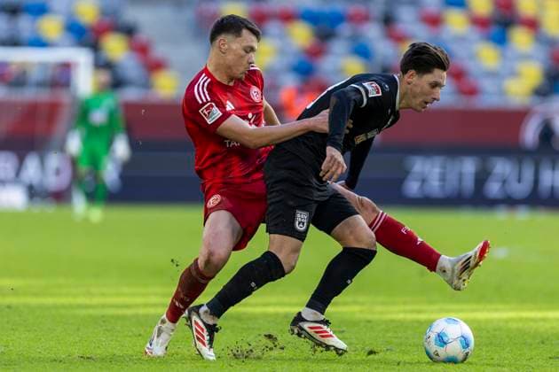 2 Bundesliga Fortuna Düsseldorf SSV Ulm 1846 Fussball, 01 02 2024 Dzenan Pejcinovic Fortuna Düsseldorf, 7 in duel with Semir Telalovic SSV Ulm 1846 Fussball, 29 2 Bundesliga, Fortuna Düsseldorf SSV Ulm 1846 Fussball, 20 Spieltag, am 01 02 2024, Merkur Spiel Arena, Düsseldorf DFL regulations prohibit any use of photographs as image sequences and or quasi video Copyright: xBEAUTIFULxSPORTS Meuselx