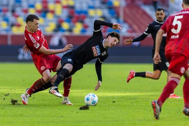 2 Bundesliga Fortuna Düsseldorf SSV Ulm 1846 Fussball, 01 02 2024 Dzenan Pejcinovic Fortuna Düsseldorf, 7 in duel with Semir Telalovic SSV Ulm 1846 Fussball, 29 2 Bundesliga, Fortuna Düsseldorf SSV Ulm 1846 Fussball, 20 Spieltag, am 01 02 2024, Merkur Spiel Arena, Düsseldorf DFL regulations prohibit any use of photographs as image sequences and or quasi video Copyright: xBEAUTIFULxSPORTS Meuselx
