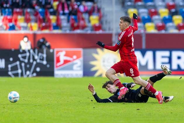2 Soccer Bundesliga Fortuna Düsseldorf SSV Ulm 1846 Soccer, 01 02 2024 Isak Bergmann Johannesson Fortuna Düsseldorf, 8 in duel with Max Brandt SSV Ulm 1846 Soccer, 23 2 Soccer Bundesliga, Fortuna Düsseldorf SSV Ulm 1846 Soccer, 20 Matchday, on 01 02 2024, Merkur Spiel Arena, Düsseldorf DFL regulations prohibit any use of photographs as image sequences and or quasi video Copyright: xBEAUTIFULxSPORTS Meuselx