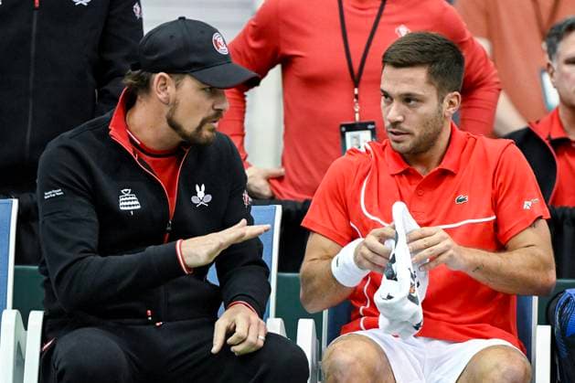 February 1, 2025, Montreal, Pq, Canada: Team Canada captain Frank Dancevic, left, talks with palyer Alexis Galarneau during his Davis Cup qualifying tennis match against Fabian Marozsan, of Hungary, in Montreal on Saturday, February 1, 2025. Alexis Galarneau, Fabian Marozsan, Frank Dancevic, - ZUMAc35_ 20250201_zaf_c35_021 Copyright: xGrahamxHughesx