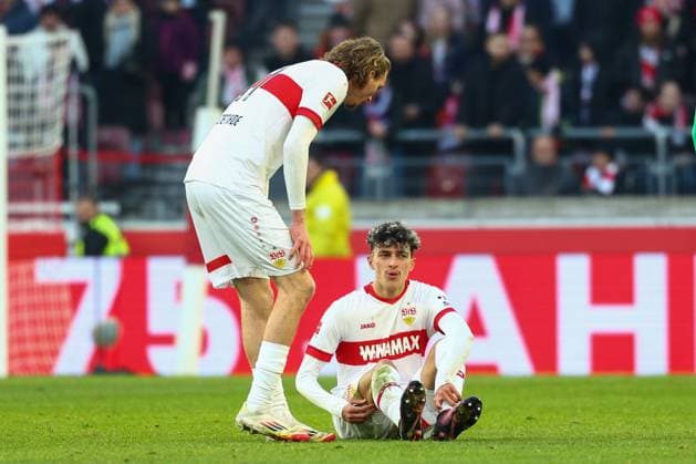 01 02 2025 Germany, Stuttgart Football Bundesliga, Season 2024 2025, VfB Stuttgart vs Borussia Mönchengladbach, Ameen Al Dakhil VfB sits injured on the ground According to the regulations of the DFL German Football League, it is prohibited to exploit or have exploited photographs taken in the stadium and or of the match in the form of sequential images and or video-like photo series