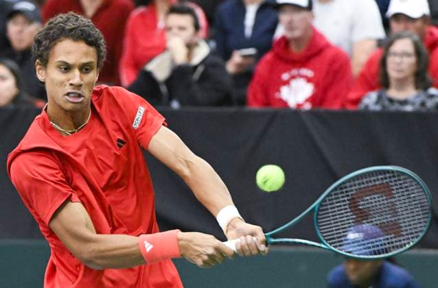 February 1, 2025, Montreal, Pq, Canada: Gabriel Diallo, of Canada, plays a shot to Marton Fucsovics, of Hungary, during their Davis Cup qualifying tennis match in Montreal on Saturday, February 1, 2025. Gabriel Diallo, Marton Fucsovics, - ZUMAc35_ 20250201_zaf_c35_096 Copyright: xGrahamxHughesx
