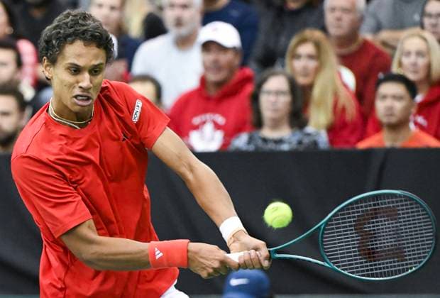 February 1, 2025, Montreal, Pq, Canada: Gabriel Diallo, of Canada, plays a shot to Marton Fucsovics, of Hungary, during their Davis Cup qualifying tennis match in Montreal on Saturday, February 1, 2025. Gabriel Diallo, Marton Fucsovics, - ZUMAc35_ 20250201_zaf_c35_112 Copyright: xGrahamxHughesx