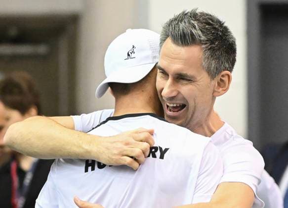 February 1, 2025, Montreal, Pq, Canada: Team Hungary captain Kornel Bardoczky embraces player Marton Fucsovics following his win over Gabriel Diallo, of Canada, in their Davis Cup qualifying tennis match in Montreal on Saturday, February 1, 2025. Gabriel Diallo, Marton Fucsovics, Kornel Bardoczky, - ZUMAc35_ 20250201_zaf_c35_117 Copyright: xGrahamxHughesx