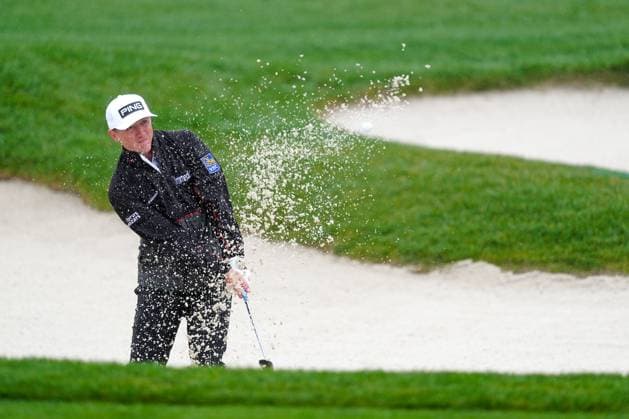 PEBBLE BEACH, CA - FEBRUARY 01: PGA, Golf Herren golfer Mackenzie Hughes hits a sand shot on the 17th hole during the third round of the AT&T Pebble Beach Pro AM on February 1, 2025, at Pebble Beach Golf Links in Pebble Beach, California. (Photo by Brian Spurlock Icon Sportswire) GOLF: FEB 01 PGA AT&T Pebble Beach Pro-Am EDITORIAL USE ONLY Icon25020152