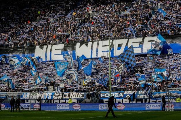 Day of remembrance of the liberation of the Auschwitz concentration camp Together against forgetting Never again banner of the HSV fans Germany , Hamburg , Volksparkstadion , Football , 2 Bundesliga , Hamburger SV Hannover 96