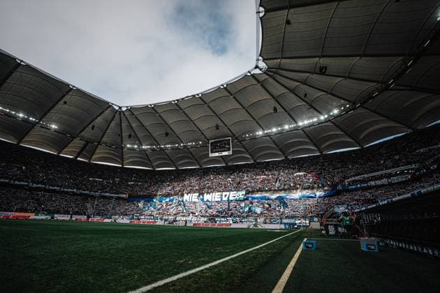 Soccer Men Season 2024 2025 2 Soccer Bundesliga 20 Matchday Hamburger SV vs Hannover 96 02 02 2025 The Nordkurve with fans of HSV with a banner Nie Wieder Hamburg Volksparkstadion Hamburg Germany