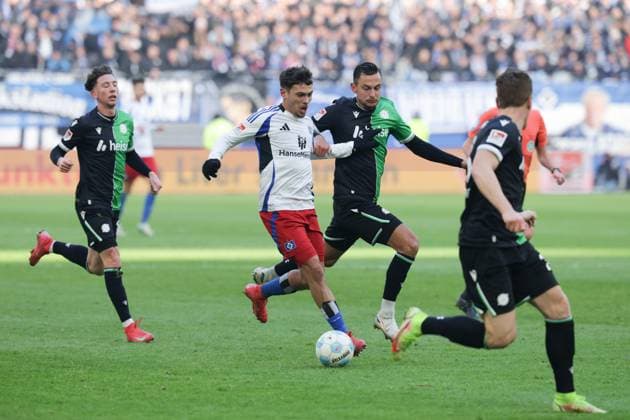 GER,Hamburg, Fußball, DFB, Hamburger SV vs Hannover 96 , im Hamburger Volksparkstadion , 02 02 2025 , v l William Mikelbrencis Hamburger SV Bartlomiej Wdowik Hannover 96 DFL regulations prohibit any use of photographs as image sequences and or quasi video Copyright: HMBxMedia FernandoxSoares