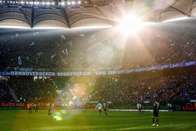 Match scene Banner Hannoverscher Sportverein von 1896 backlight sunlight fog HSV Hannover Germany , Hamburg , Volksparkstadion , Football , 2 Bundesliga , Hamburger SV Hannover 96