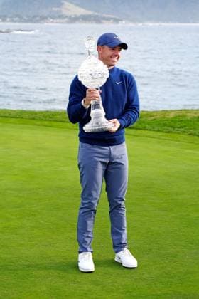 PEBBLE BEACH, CA - FEBRUARY 02: PGA, Golf Herren golfer Rory McIlroy poses with the the trophy after winning the AT&T Pebble Beach Pro AM on February 2, 2025, at Pebble Beach Golf Links in Pebble Beach, California. (Photo by Brian Spurlock Icon Sportswire) GOLF: FEB 02 PGA AT&T Pebble Beach Pro-Am EDITORIAL USE ONLY Icon25020210