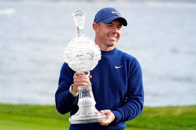 PEBBLE BEACH, CA - FEBRUARY 02: PGA, Golf Herren golfer Rory McIlroy poses with the the trophy after winning the AT&T Pebble Beach Pro AM on February 2, 2025, at Pebble Beach Golf Links in Pebble Beach, California. (Photo by Brian Spurlock Icon Sportswire) GOLF: FEB 02 PGA AT&T Pebble Beach Pro-Am EDITORIAL USE ONLY Icon2502028