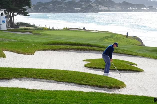 PEBBLE BEACH, CA - FEBRUARY 02: PGA, Golf Herren golfer Rory McIlroy plays a shot from a fairway bunker on the 10th hole during the final round of the AT&T Pebble Beach Pro AM on February 2, 2025, at Pebble Beach Golf Links in Pebble Beach, California. (Photo by Brian Spurlock Icon Sportswire) GOLF: FEB 02 PGA AT&T Pebble Beach Pro-Am EDITORIAL USE ONLY Icon25020215