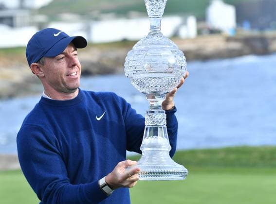 February 2, 2025, Pebble Beach, Ca, USA: Rory McIlroy is seen holding the Winners Trophy on the 18th hole Green after the final round of the AT&T Pebble Beach Pro-Am 2025 at Pebble Beach Golf Links on February 02, 2025 in Pebble Beach, California. Photo: Casey Flanigan imageSPACE Pebble Beach USA - ZUMAi237 20250202_zsa_i237_097 Copyright: xFlanigan Imagespacex