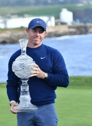 February 2, 2025, Pebble Beach, Ca, USA: Rory McIlroy is seen holding the Winners Trophy on the 18th hole Green after the final round of the AT&T Pebble Beach Pro-Am 2025 at Pebble Beach Golf Links on February 02, 2025 in Pebble Beach, California. Photo: Casey Flanigan imageSPACE Pebble Beach USA - ZUMAi237 20250202_zsa_i237_100 Copyright: xFlanigan Imagespacex