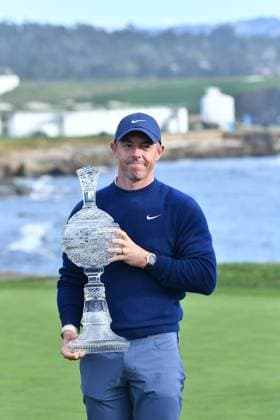 February 2, 2025, Pebble Beach, Ca, USA: Rory McIlroy is seen holding the Winners Trophy on the 18th hole Green after the final round of the AT&T Pebble Beach Pro-Am 2025 at Pebble Beach Golf Links on February 02, 2025 in Pebble Beach, California. Photo: Casey Flanigan imageSPACE Pebble Beach USA - ZUMAi237 20250202_zsa_i237_101 Copyright: xFlanigan Imagespacex