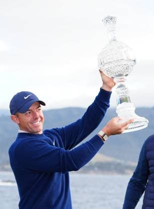 PEBBLE BEACH, CA - FEBRUARY 02: PGA, Golf Herren golfer Rory McIlroy holds the trophy up after winning the AT&T Pebble Beach Pro AM on February 2, 2025, at Pebble Beach Golf Links in Pebble Beach, California. (Photo by Brian Spurlock Icon Sportswire) GOLF: FEB 02 PGA AT&T Pebble Beach Pro-Am EDITORIAL USE ONLY Icon25020265