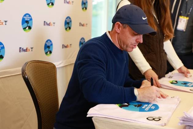 PEBBLE BEACH, CA - FEBRUARY 02: PGA, Golf Herren golfer Rory McIlroy autographs hole number 18 pin flags after winning the AT&T Pebble Beach Pro AM on February 2, 2025, at Pebble Beach Golf Links in Pebble Beach, California. (Photo by Brian Spurlock Icon Sportswire) GOLF: FEB 02 PGA AT&T Pebble Beach Pro-Am EDITORIAL USE ONLY Icon25020273