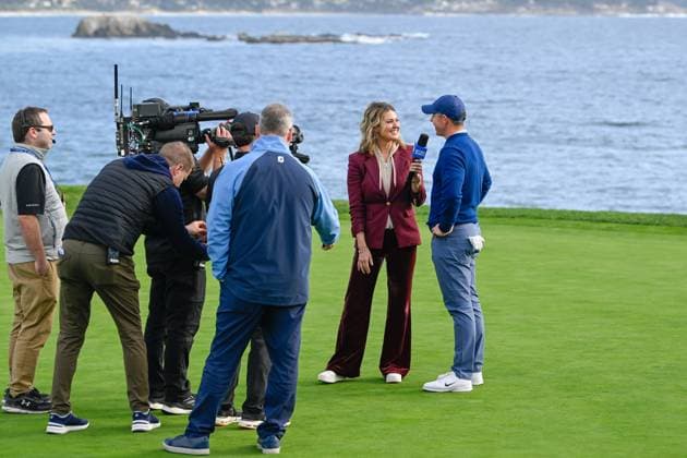 PEBBLE BEACH, CA - FEBRUARY 02: Rory McIlroy (NIR) is interviewed by CBS Sports reporter Amanda Balionis on the green on 18 after winning the AT&T Pebble Beach Pro-Am at Pebble Beach Golf Links on February 2, 2025, in Pebble Beach, California. (Photo by Ken Murray Icon Sportswire) GOLF: FEB 02 PGA, Golf Herren AT&T Pebble Beach Pro-Am EDITORIAL USE ONLY Icon250202035
