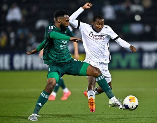 AFC CHAMPIONS LEAGUE ELITE, AL SADD SC (QTR) v AL AHLI SAUDI FC (KSA) Mohamed Camara (R) of Al Sadd SC and Feras Al Brikan of Al Ahli SFC in action during the AFC Champions League elite west football match between Qatar s Al Sadd SC and Saudi Arabia s Al Ahli SFC at Jassim Bin Hamad Stadium in Doha, Qatar, on February 03, 2024. DOHA Qatar Copyright: xNAUSHADx