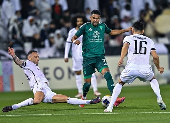 AFC CHAMPIONS LEAGUE ELITE, AL SADD SC (QTR) v AL AHLI SAUDI FC (KSA) Guilherme Torres (L) of Al Sadd SC and Riyad Mahrez of Al Ahli SFC in action during the AFC Champions League elite west football match between Qatar s Al Sadd SC and Saudi Arabia s Al Ahli SFC at Jassim Bin Hamad Stadium in Doha, Qatar, on February 03, 2024. DOHA Qatar Copyright: xNAUSHADx