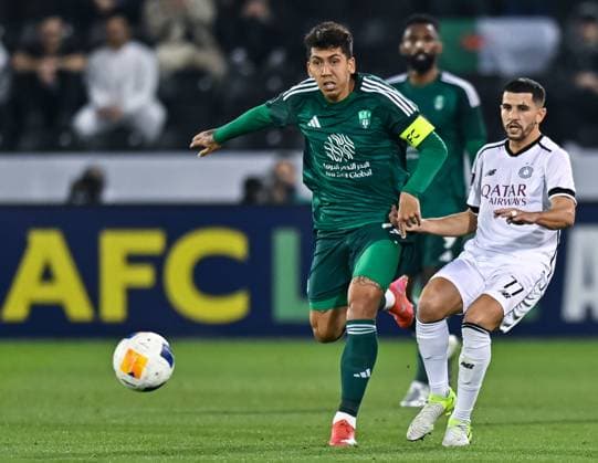 AFC CHAMPIONS LEAGUE ELITE, AL SADD SC (QTR) v AL AHLI SAUDI FC (KSA) Youcef Atal (R) of Al Sadd SCC and Roberto Firmino of Al Ahli SFC in action during the AFC Champions League elite west football match between Qatar s Al Sadd SC and Saudi Arabia s Al Ahli SFC at Jassim Bin Hamad Stadium in Doha, Qatar, on February 03, 2024. DOHA Qatar Copyright: xNAUSHADx