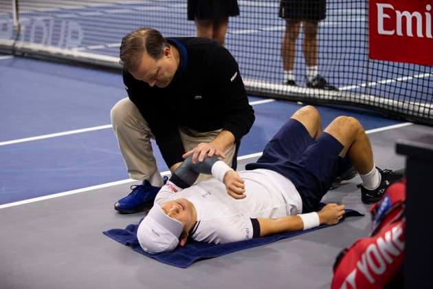 February 7, 2025, Frisco, Texas, USA: YOSHIHITO NISHIOKA (JPN) is tended to by a medical trainer in a singles quarterfinal match against CASPER RUUD (NOR) during day seven of the 2025 Dallas Open at the Star in Frisco, TX. CASPER RUUD (NOR) defeated YOSHIHITO NISHIOKA (JPN), 7:5, 3:2. Nishioka forfeited the match due to injury. Frisco USA - ZUMAh193 20250207_zsp_h193_042 Copyright: xDanielxMcGregor-Huyerx