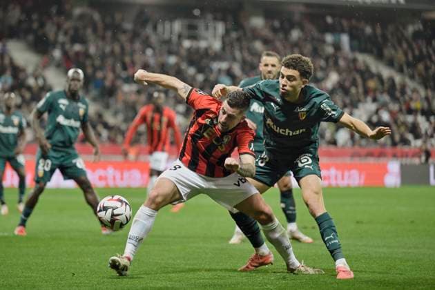 FOOTBALL : OGC Nice vs RC Lens - ligue 1 - 8 02 25 Nice™s midfielder 28 Baptiste Santamaria and RC Lens s 23 Neil El Aynaoui during the French L1 football match between Nice (OGC Nice) and Lens (RC Lens) at Allianz Riviera Stadium of Nice, south France, on February 8, 2025. NICEFrance  Copyright: xfredxDIDES psnewzx
