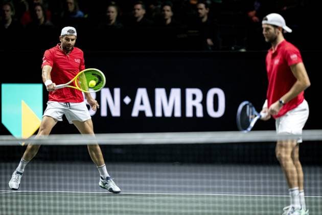ROTTERDAM - Simone Bolelli (ITA) and Andrea Vavassori (ITA) in action against Sander Gille (BEL) and Jan Zielinski (POL) during the final doubles match on the seventh day of the ABN AMRO Open tennis tournament in Ahoy. ANP SANDER KING ABN AMRO Open - Day Seven 2025 xVIxANPxSportx xxANPxIVx 519515830 originalFilename: 519515830.jpg