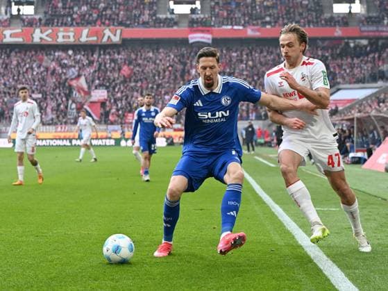 Janik Bachmann FC Schalke 04 and Mathias Olesen 1 FC Koeln in a duel during the 2 Bundesliga match between 1 FC Köln and FC Schalke 04 at RheinEnergieStadion on February 09, 2025 in Cologne, Germany Photo by Ralf Treese DeFodi Images Janik Bachmann FC Schalke 04 and Mathias Olesen 1 FC Koeln battle for the ball during the 2 Bundesliga match between 1 FC Köln and FC Schalke 04 at RheinEnergieStadion on February 9, 2025 in Cologne, Germany Photo by Ralf Treese DeFodi Images DFB DFL REGULATIONS PROHIBIT ANY USE OF PHOTOGRAPHS AS IMAGE SEQUENCES AND OR QUASI VIDEO Photo by Ralf Treese DeFodi Images Defodi 521 KOES0420250209 016 Defodi-521 DFB DFL REGULATIONS PROHIBIT ANY USE OF PHOTOGRAPHS AS IMAGE SEQUENCES AND OR QUASI-VIDEO.