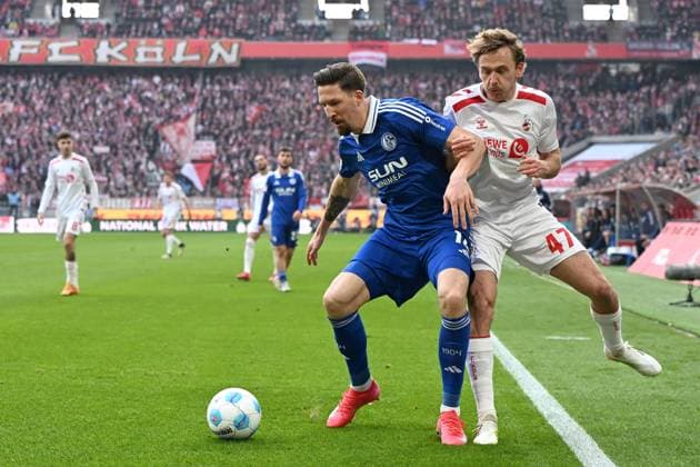 Janik Bachmann FC Schalke 04 and Mathias Olesen 1 FC Koeln in a duel during the 2 Bundesliga match between 1 FC Köln and FC Schalke 04 at RheinEnergieStadion on February 09, 2025 in Cologne, Germany Photo by Ralf Treese DeFodi Images Janik Bachmann FC Schalke 04 and Mathias Olesen 1 FC Koeln battle for the ball during the 2 Bundesliga match between 1 FC Köln and FC Schalke 04 at RheinEnergieStadion on February 9, 2025 in Cologne, Germany Photo by Ralf Treese DeFodi Images DFB DFL REGULATIONS PROHIBIT ANY USE OF PHOTOGRAPHS AS IMAGE SEQUENCES AND OR QUASI VIDEO Photo by Ralf Treese DeFodi Images Defodi 521 KOES0420250209 017 Defodi-521 DFB DFL REGULATIONS PROHIBIT ANY USE OF PHOTOGRAPHS AS IMAGE SEQUENCES AND OR QUASI-VIDEO.