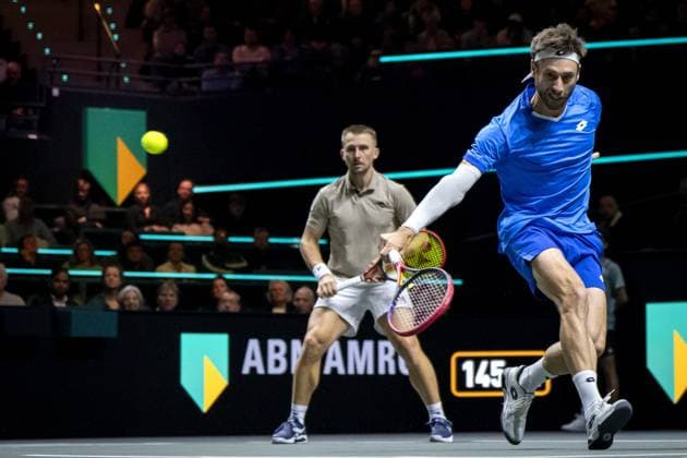 ROTTERDAM - Sander Gille (BEL) and Jan Zielinski (POL) in action against Simone Bolelli (ITA) and Andrea Vavassori (ITA) during the final doubles match on the seventh day of the ABN AMRO Open tennis tournament in Ahoy. ANP SANDER KING ABN AMRO Open - Day Seven 2025 xVIxANPxSportx xxANPxIVx 519516661 originalFilename: 519516661.jpg