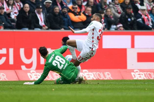 Goalkeeper Justin Heekeren FC Schalke 04 and Linton Maina 1 FC Koeln in a duel during the 2 Bundesliga match between 1 FC Köln and FC Schalke 04 at RheinEnergieStadion on February 09, 2025 in Cologne, Germany Photo by Ralf Treese DeFodi Images Goalkeeper Justin Heekeren FC Schalke 04 and Linton Maina 1 FC Koeln battle for the ball during the 2 Bundesliga match between 1 FC Köln and FC Schalke 04 at RheinEnergieStadion on February 9, 2025 in Cologne, Germany Photo by Ralf Treese DeFodi Images DFB DFL REGULATIONS PROHIBIT ANY USE OF PHOTOGRAPHS AS IMAGE SEQUENCES AND OR QUASI VIDEO Photo by Ralf Treese DeFodi Images Defodi 521 KOES0420250209 018 Defodi-521 DFB DFL REGULATIONS PROHIBIT ANY USE OF PHOTOGRAPHS AS IMAGE SEQUENCES AND OR QUASI-VIDEO.