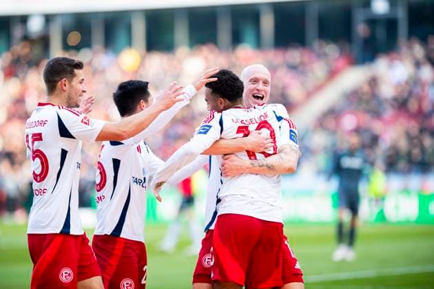09 02 2025 Soccer, 2024 2025, 2 Bundesliga, Matchday 21, Hannover 96 Fortuna Düsseldorf 95 2R Myron van Brederode Düsseldorf celebrates after his goal to 0 1 with L R Tim Oberdorf Düsseldorf , Shinta Appelkamp Düsseldorf , Valgeir Lunddal Düsseldorf DFL REGULATIONS PROHIBIT ANY USE OF PHOTOGRAPHS AS IMAGE SEQUENCES AND OR QUASI VIDEO Hannover Niedersachsen Germany Heinz von Heiden Arena