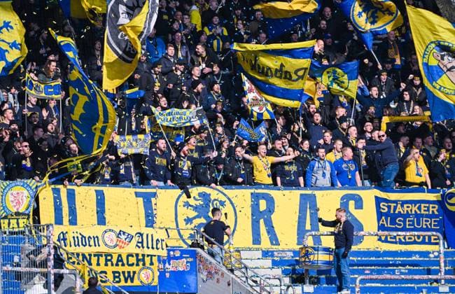Fans of Eintracht Braunschweig during the 2 Bundesliga match between Karlsruher SC and Eintracht Braunschweig at BBBank Wildpark on February 09, 2025 in Karlsruhe, Germany Photo by Silas Schueller De Fodi Images Fans of Eintracht Braunschweig during the 2 Bundesliga match between Karlsruher SC and Eintracht Braunschweig at BBBank Wildpark on February 9, 2025 in Karlsruhe, Germany Photo by Silas Schueller De Fodi Images DFB DFL REGULATIONS PROHIBIT ANY USE OF PHOTOGRAPHS AS IMAGE SEQUENCES AND OR QUASI VIDEO Defodi 738 738 KSCBRA 20250209 139 Defodi- DFB DFL REGULATIONS PROHIBIT ANY USE OF PHOTOGRAPHS AS IMAGE SEQUENCES AND OR QUASI-VIDEO.