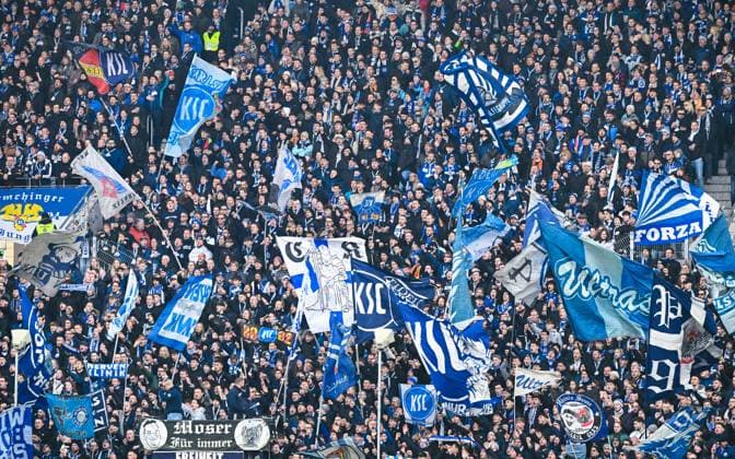 Fans of Karlsruher SC during the 2 Bundesliga match between Karlsruher SC and Eintracht Braunschweig at BBBank Wildpark on February 09, 2025 in Karlsruhe, Germany Photo by Silas Schueller De Fodi Images Fans of Karlsruher SC during the 2 Bundesliga match between Karlsruher SC and Eintracht Braunschweig at BBBank Wildpark on February 9, 2025 in Karlsruhe, Germany Photo by Silas Schueller De Fodi Images DFB DFL REGULATIONS PROHIBIT ANY USE OF PHOTOGRAPHS AS IMAGE SEQUENCES AND OR QUASI VIDEO Defodi 738 738 KSCBRA 20250209 140 Defodi- DFB DFL REGULATIONS PROHIBIT ANY USE OF PHOTOGRAPHS AS IMAGE SEQUENCES AND OR QUASI-VIDEO.