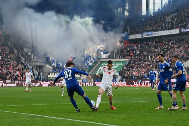 Max Grueger FC Schalke 04 and Dejan Ljubicic 1 FC Köln in a duel during the 2 Bundesliga match between 1 FC Köln and FC Schalke 04 at RheinEnergieStadion on February 09, 2025 in Cologne, Germany Photo by Ralf Treese DeFodi Images Max Grueger FC Schalke 04 and Dejan Ljubicic 1 FC Köln battle for the ball during the 2 Bundesliga match between 1 FC Köln and FC Schalke 04 at RheinEnergieStadion on February 9, 2025 in Cologne, Germany Photo by Ralf Treese DeFodi Images DFB DFL REGULATIONS PROHIBIT ANY USE OF PHOTOGRAPHS AS IMAGE SEQUENCES AND OR QUASI VIDEO Photo by Ralf Treese DeFodi Images Defodi 521 KOES0420250209 033 Defodi-521 DFB DFL REGULATIONS PROHIBIT ANY USE OF PHOTOGRAPHS AS IMAGE SEQUENCES AND OR QUASI-VIDEO.