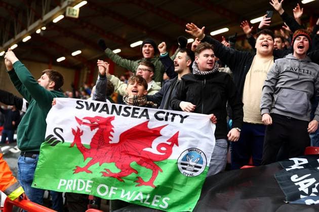 Swansea City fans celebrate. Bristol City v Swansea City, EFL Sky Bet Championship, Football, Ashton Gate, Bristol, UK - 09 Feb 2025 EDITORIAL USE ONLY No use with unauthorised audio, video, data, fixture lists, club league logos or live services. Online in-match use limited to 120 images, no video emulation. No use in betting, games or single club league player publications.  Copyright: xJamesxMarsh Shutterstockx 15136749at
